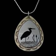 Cutout Heron Necklace Silver and Brass