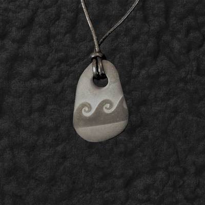 Carved 2025 stone pendant